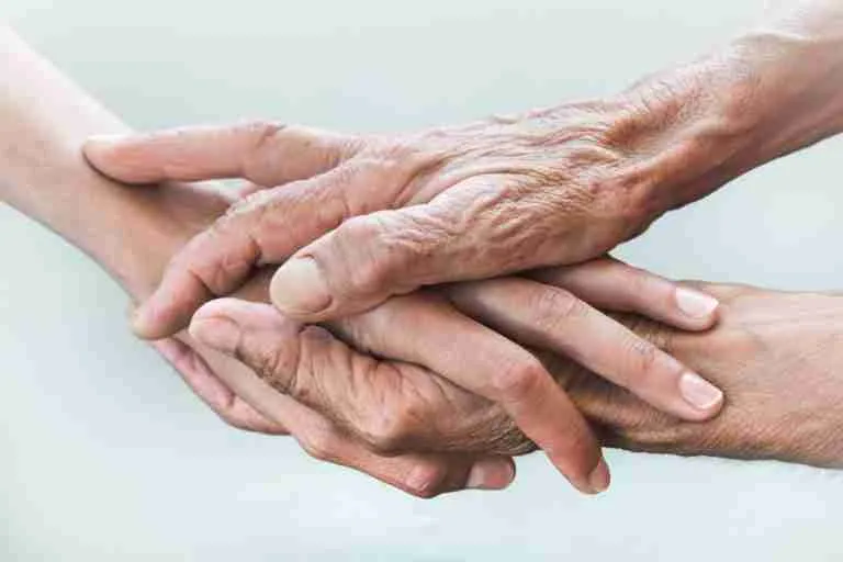 young and old adult hands