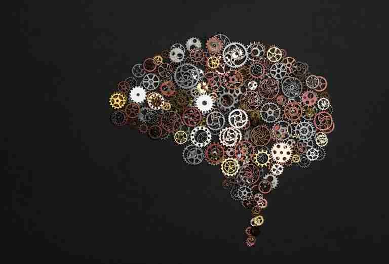 Brain image made of little cogwheels to represent our reticular activating system