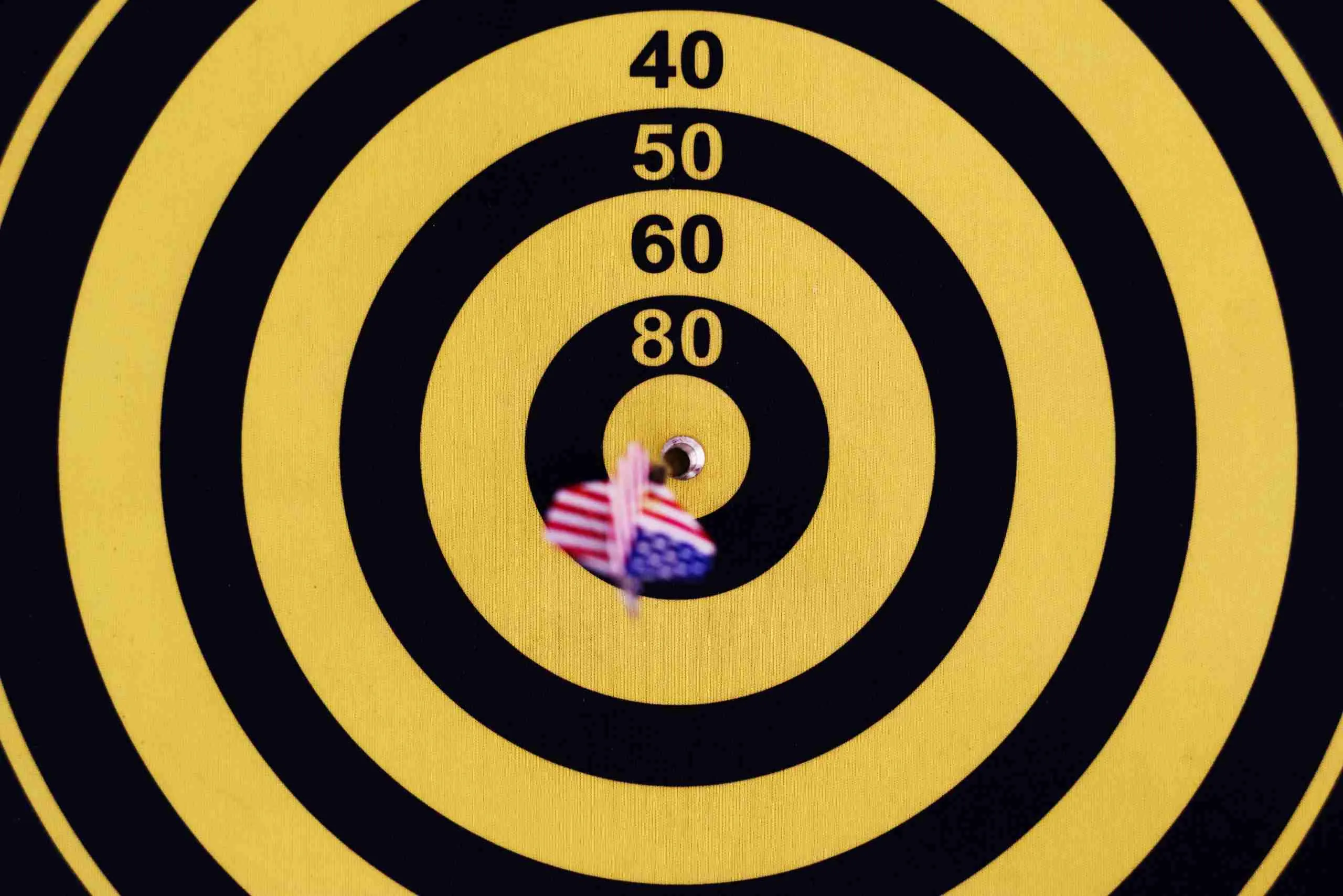 Bullseye score on dartboard - consistency pays off